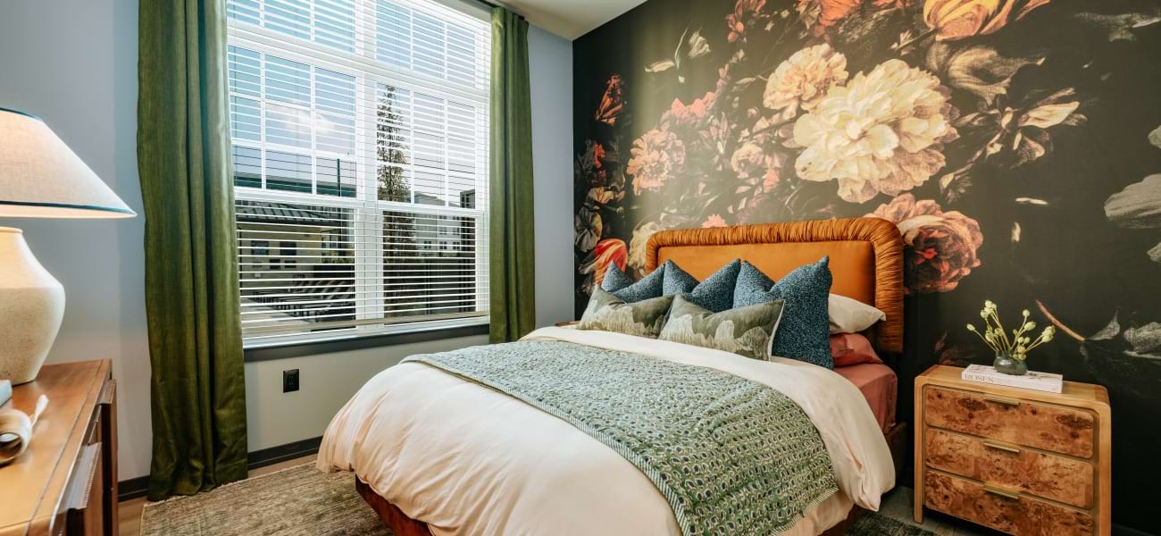 A new standard of living Bedroom with natural lighting and high ceilings